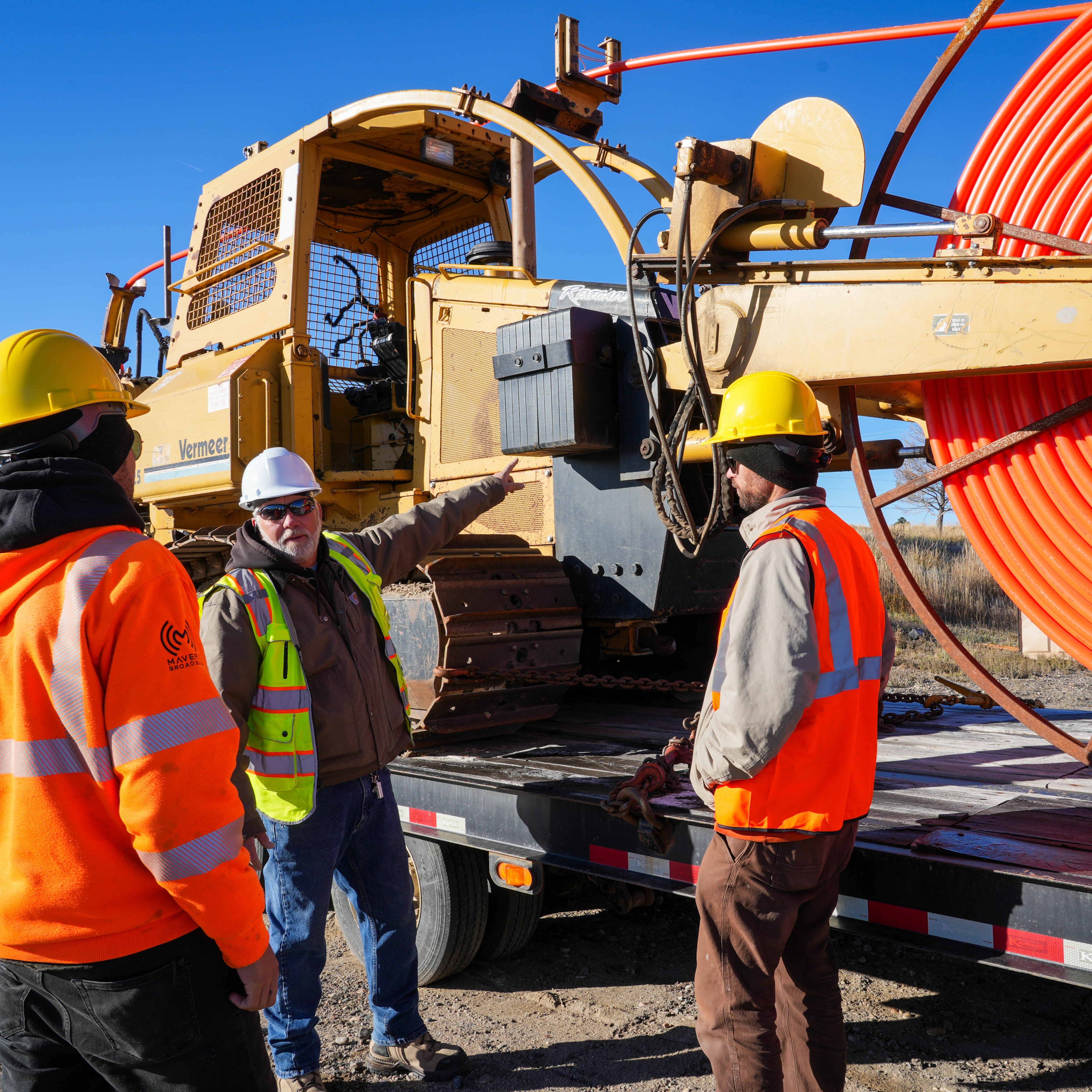 Men expecting construction equipment